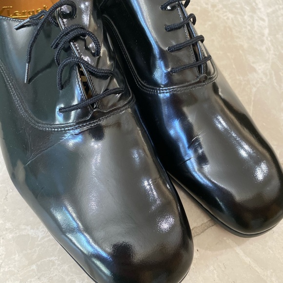 Black shiny men’s shoes made in France.